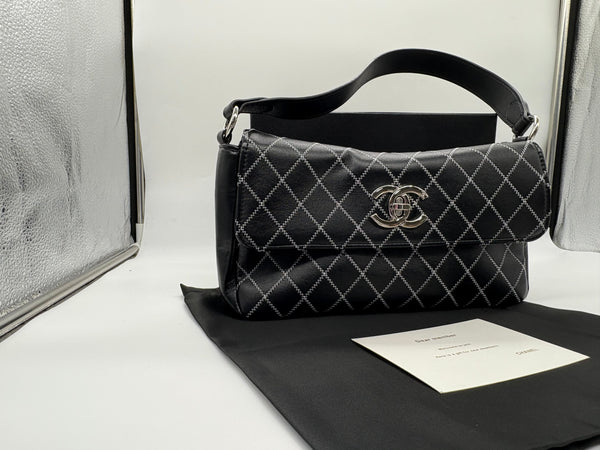 Chanel Lambskin Quilted Handbag - Classic Elegance